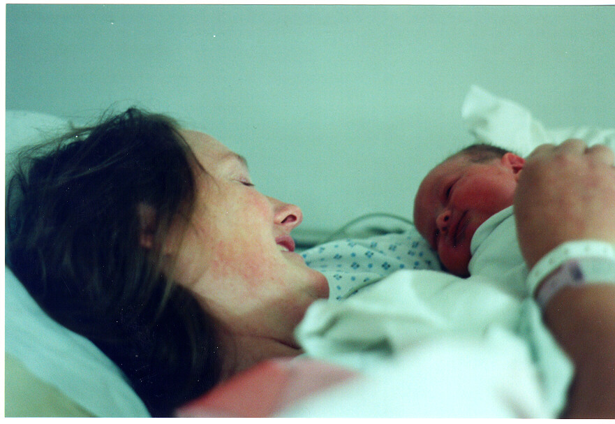 Sue holding Allison in the recovery room